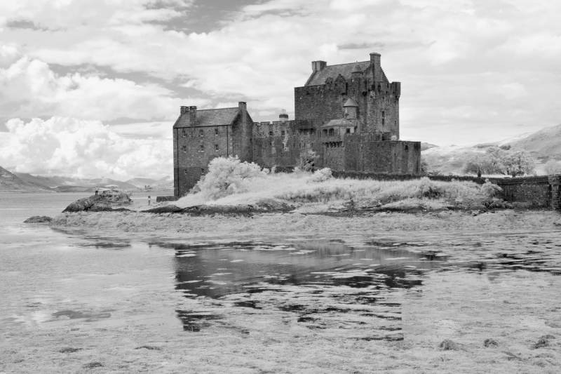 Roadside view of Eilean Donan Castle in infrared, Scotland Fine Art Prints